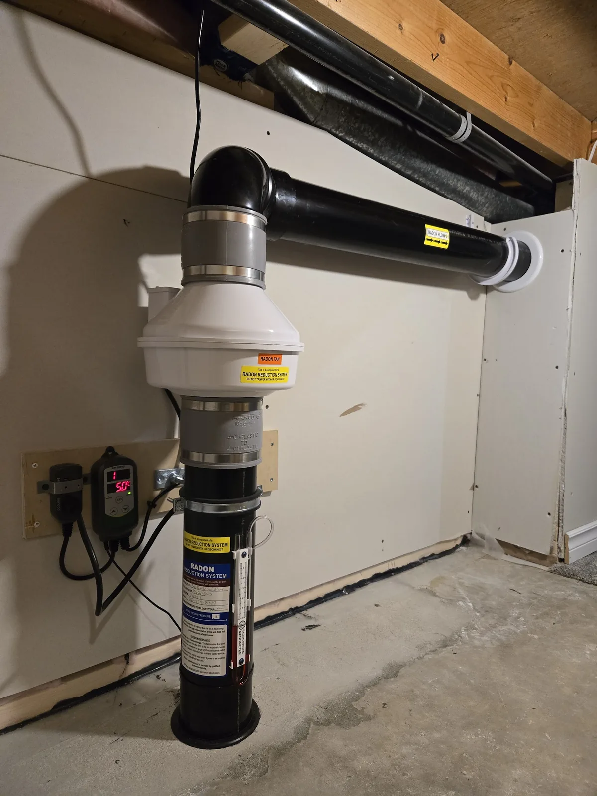 A radon mitigation system installed in a Regina home by Sask Air Solutions